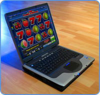 Playing online slot game using laptop